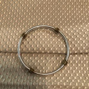 Jewelry - sterling silver bangle bracelet with gold accents Jewelry - sterling silver bangle bracelet with gold accents